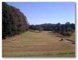 Tally Valley Public Golf Course - Elanora Gold Coast: Fairway view on Hole 4 with green in the distance.