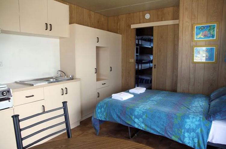 Anglers Rest Riverside Caravan Park - Greenwell Point: Kitchen area and bedroom cabin 3