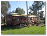 Griffith Caravan Village - Griffith: Historic train carriage with lots of bits and pieces