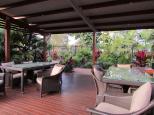 Gold Coast Holiday Park - Helensvale: Poolside tables and BBQs