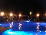 Gold Coast Holiday Park - Helensvale: Poolside at night