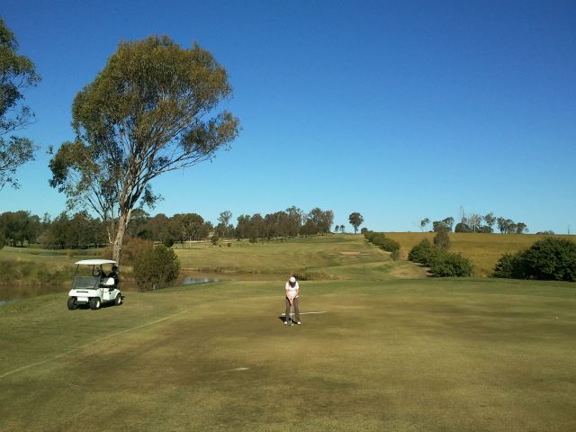 Hills International Golf Club - Jimboomba: Green on hole 2 looking back along the fairway.