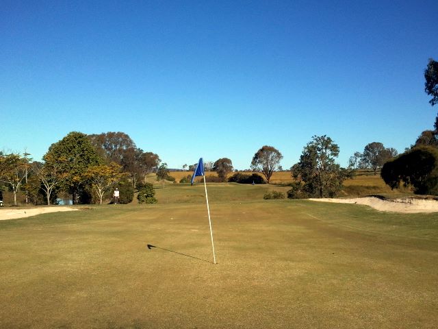 Hills International Golf Club - Jimboomba: Green on Hole 3 looking back along the fairway.