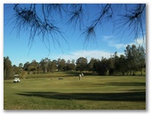 Hills International Golf Club - Jimboomba: Green on Hole 8 looking back along the fairway.