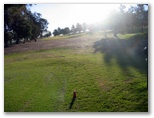 Junee Golf Course - Junee: Fairway view Hole 7 - note steep camber