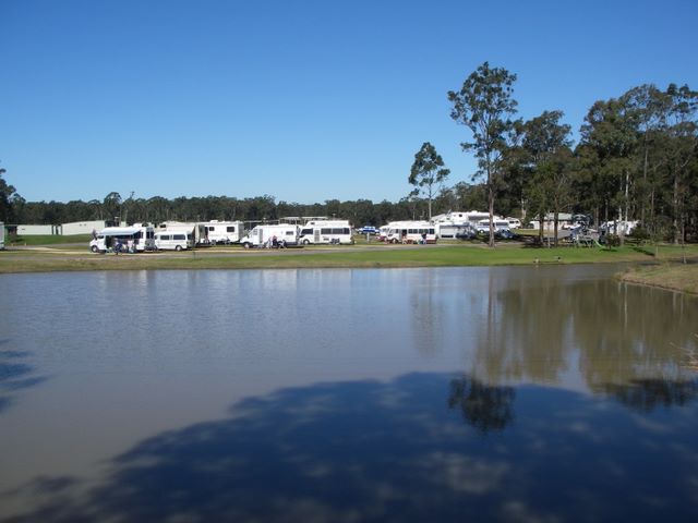 Australian Motor Homes Tourist Park - Karuah: View of the Caravan Park across the Lake