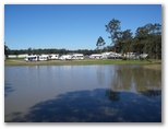 Australian Motor Homes Tourist Park - Karuah: View of the Caravan Park across the Lake