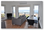 Kilcunda Oceanview Holiday Retreat - Kilcunda Central District: Lounge room with expansive ocean views