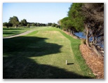 Kogarah Golf Course - Kogarah: Fairway view Hole 8 with continuous water on the right