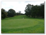 Kyneton Golf Club - Kyneton: Green on Hole 3 looking back along the fairway.