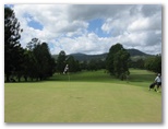 Kyogle Golf Course - Kyogle: Green on Hole 6 looking back along the fairway.