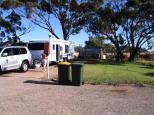 Lake Grace Caravan Park - Lake Grace: Back in site with a Lawn area to sit and relax and have a barbecue under the shady trees.