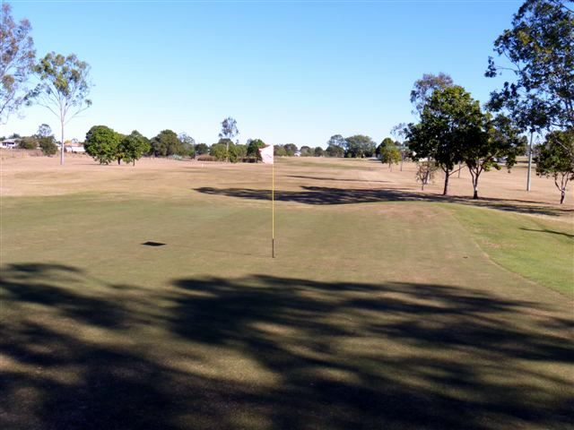Lowood and District Golf Club - Lowood: Green on Hole 1 looking back along the fairway.