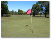 Lowood and District Golf Club - Lowood: Green on Hole 5 looking back along the fairway.