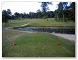 Maclean Golf Course - Maclean: Social players are spared the lake - the yellow tees are beyond the water.