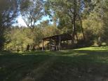 Blue Pools Campground - Briagolong: Undercover picnic area with tables and seats.