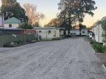 Coachstop Caravan Park - Maitland: Tourist cabins driveway getting some fresh gravel to brighten the place 