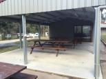 Mallacootas Shady Gully Caravan Park - Mallacoota: Undercover camp kitchen and cooking area.