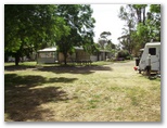 Marong Caravan and Cabin Village - Marong: Powered sites for caravans with camp kitchen in the background