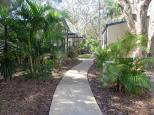 Nobby Beach Holiday Village - Miami: walkway to standard villas
