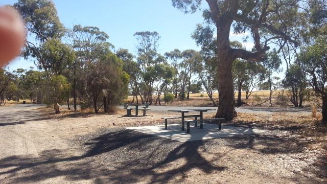 Camerons Reserve - Miram: Picnic table and seats in shade.