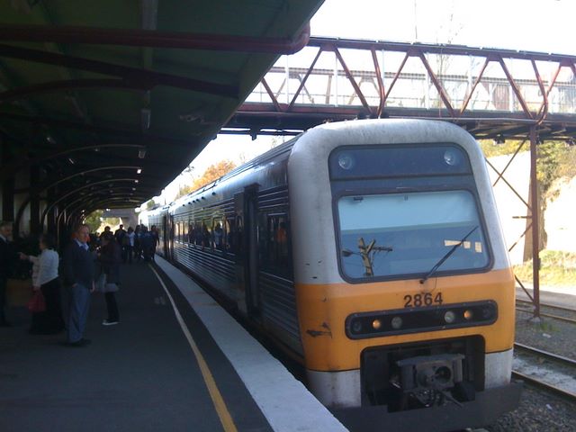 Moss Vale Railway Station - Moss Vale: Late afternoon commuter train from Sydney arrives at Moss Vale Railway Station.