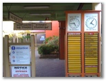 Moss Vale Railway Station - Moss Vale: Moss Vale Railway Station entrance showing arrival and departure times.