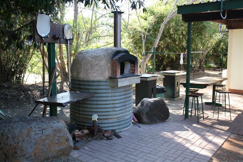 Bedrock Village Caravan Park - Mount Surprise: Wood fired pizza oven and BBQ area.  This is a marvelous facility.