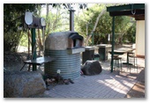 Bedrock Village Caravan Park - Mount Surprise: Wood fired pizza oven and BBQ area.  This is a marvelous facility.