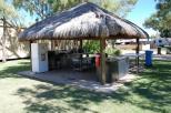 AAOK Moondarra Caravan Park - Mt Isa: the outdoor communal bali hut kitchen is perfect for an afternoon beverage and socializing