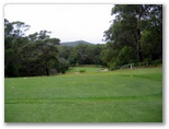 Nelson Bay Golf Course - Nelson Bay: Fairway view Hole 20 with the green a long way below
