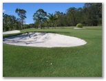 Tewantin Noosa Golf Course - Tewantin: Large bunkers guard the Green on Hole 1