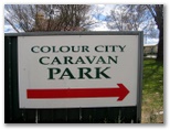 Colour City Caravan Park - Orange: Welcome sign