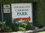 Colour City Caravan Park - Orange: Welcome sign