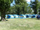Colour City Caravan Park - Orange: Tents for seasonal fruit pickers