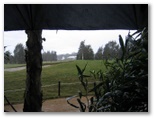 Pacific Dunes Golf Course - Medowie: Taking shelter from the rain near the green on Hole 12