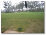 Pacific Dunes Golf Course - Medowie: Green on Hole 15 during rain shower