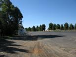 Currajong Rest Area - Parkes: Road surface is a mix of sealed and gravel.