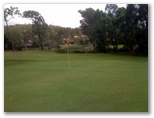 Parkwood International Golf Course - Parkwood, Gold Coast: Green on Hole 7 looking back along the fairway.