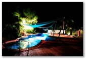 Cooke Point Holiday Park - Port Hedland: Swimming pool at night