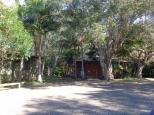 Lighthouse Beach Holiday Village - Port Macquarie: Cabins surrounded by trees