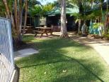 Melaleuca Caravan Park - Port Macquarie: Pool area with BBqs and camp kitchen