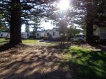 Sundowner Breakwall Tourist Park - Port Macquarie: Sites are some grass some dirt