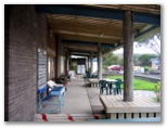 Henty Bay Beach Front Van & Cabin Park - Portland: Sitting area in front of reception and shop