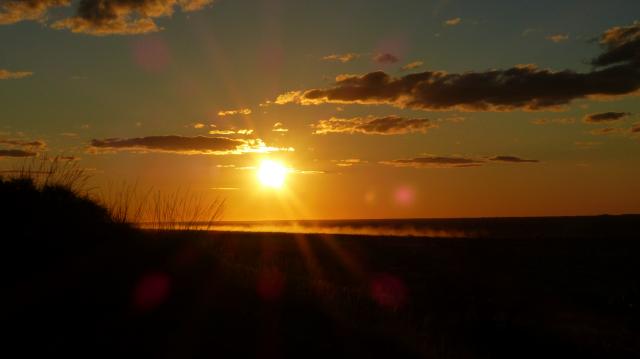 Indee Station Farmstay - Pt Hedland: Sunset from the hill at Indee Station WA