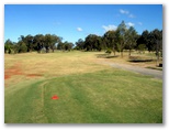 Redland Bay Golf Course - Redland Bay: Fairway view Hole 8 - the green is to the left after the dog leg