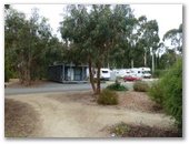 Seven Mile Beach Cabin and Caravan Park - Seven Mile Beach: Cabins scattered through powered sites. Photo by Lynn Gorman.