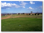 Longyard Golf Course - Tamworth: Fairway view of Hole 9 with water trap ahead of the green