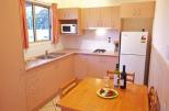 BIG4 Noosa Bougainvillia Holiday Park - Tewantin: Kitchen and Dining Room in cottage