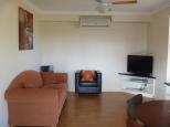 Boomerang Way Tourist Park - Tocumwal: Lounge area of Poolside Cabin 10